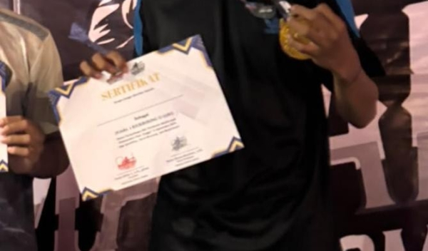 Perjuangan di Atas Ring, Arrekha Hammam Yudika Pratama Raih Juara 1 Kickboxing Malang Street Combat