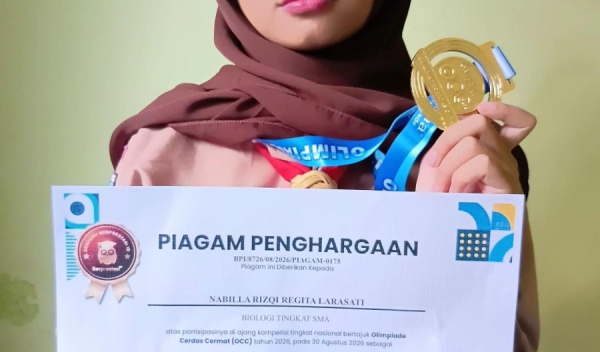 Nabilla Risqi Regina Larasati Raih Medali Emas Olimpiade Ganesha Biologi
